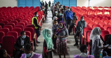 Ethiopians line up to cast their votes in the general election at a polling center in the capital Addis Ababa, Ethiopia, June 21, 2021. (AP Photo)