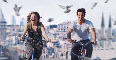 A still shot from “Dil Dhadakne Do” (“Let the Heart Beat”) shows actress Anushka Sharma and actor Ranveer Singh with a view of Istanbul in the background.