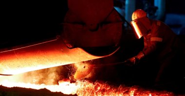 A steel worker of Germany's industrial conglomerate ThyssenKrupp AG works near a blast furnace at Germany's largest steel factory in Duisburg, Germany, Jan. 28, 2019. (Reuters Photo)