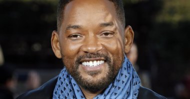 U.S actor Will Smith poses for photographers during the photo call of "Bad Boys for Life," in Paris, France, Jan. 6, 2020. (AP Photo)