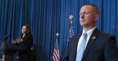 Vice President Kamala Harris speaks about the child tax credit during an event at Brookline Memorial Recreation Center as a Secret Service agent (R) stands beside her, Pittsburgh, U.S., June 21, 2021. (AP Photo)