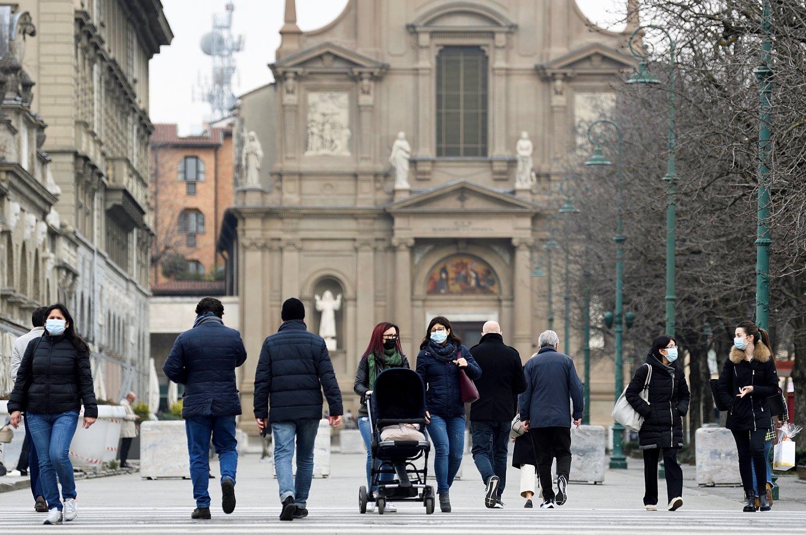 People walk on a street a year after the peak of Italy's coronavirus outbreak, in Bergamo, the country's epicenter, Italy, March 3, 2021. (Reuters Photo)