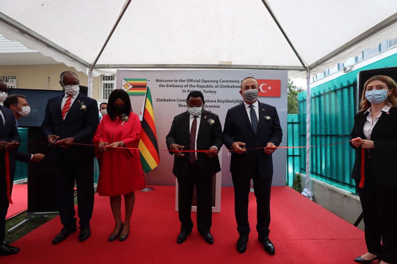 Foreign Minister Mevlüt Çavuşoğlu (R) attends the opening ceremony of the Zimbabwe Embassy in Ankara, Turkey, June 22, 2021. (AA Photo)