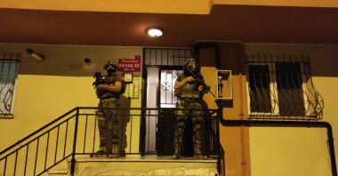 Counterterrorism squads stand in front of a building during a raid in Istanbul, Turkey, June 23, 2021. (AA Photo)