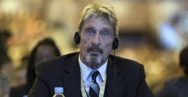 Founder of the first commercial antivirus program John McAfee listens during the 4th China Internet Security Conference (ISC) in Beijing, China, Aug. 16, 2016. (AP File Photo)