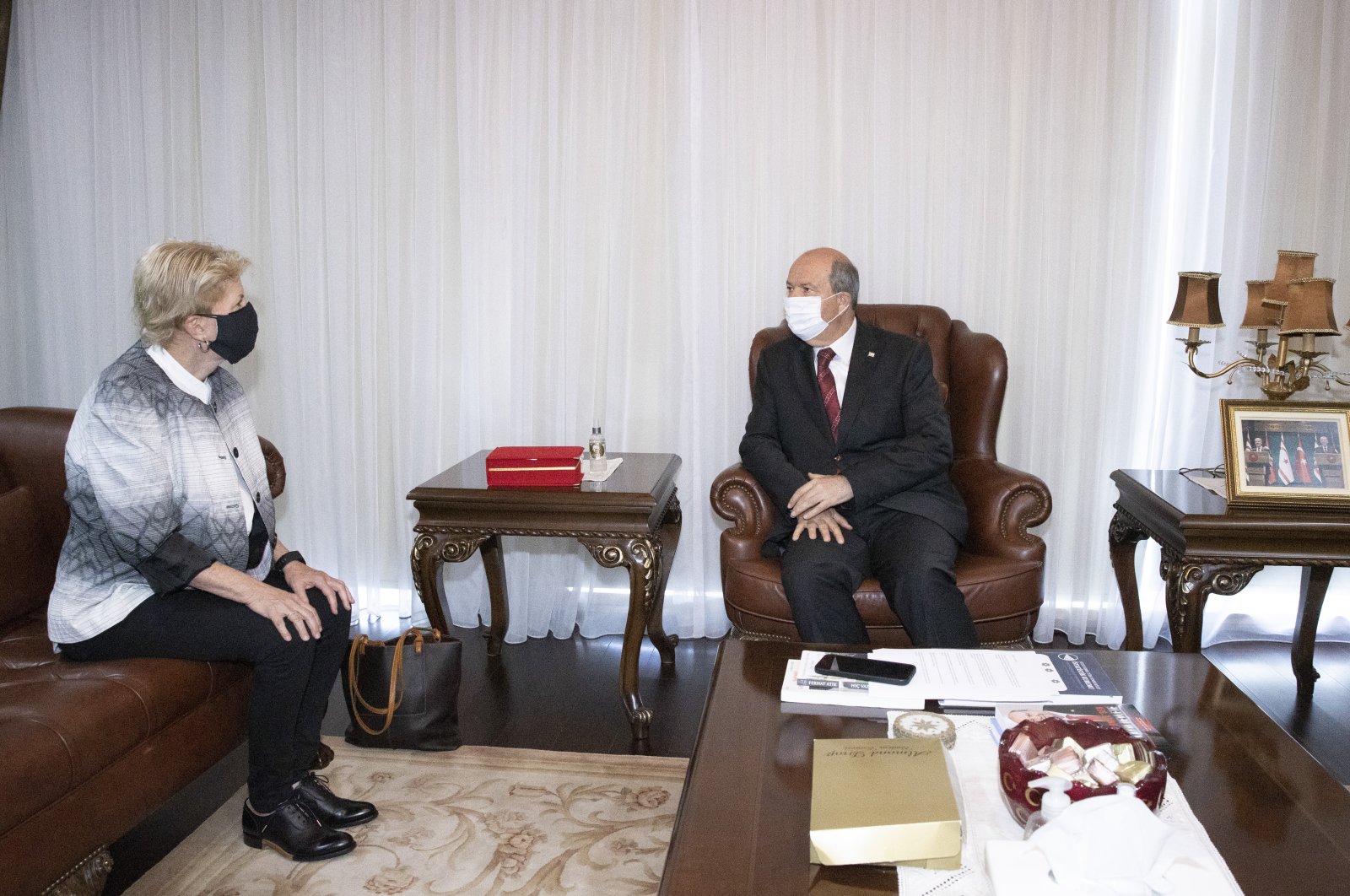 Jane Holl Lute (L), the United Nations special envoy on the Cyprus dispute, and Turkish Republic of Northern Cyprus (TRNC) President Ersin Tatar talk in Lefkoşa (Nicosia), TRNC, June 22, 2021. (AA Photo)