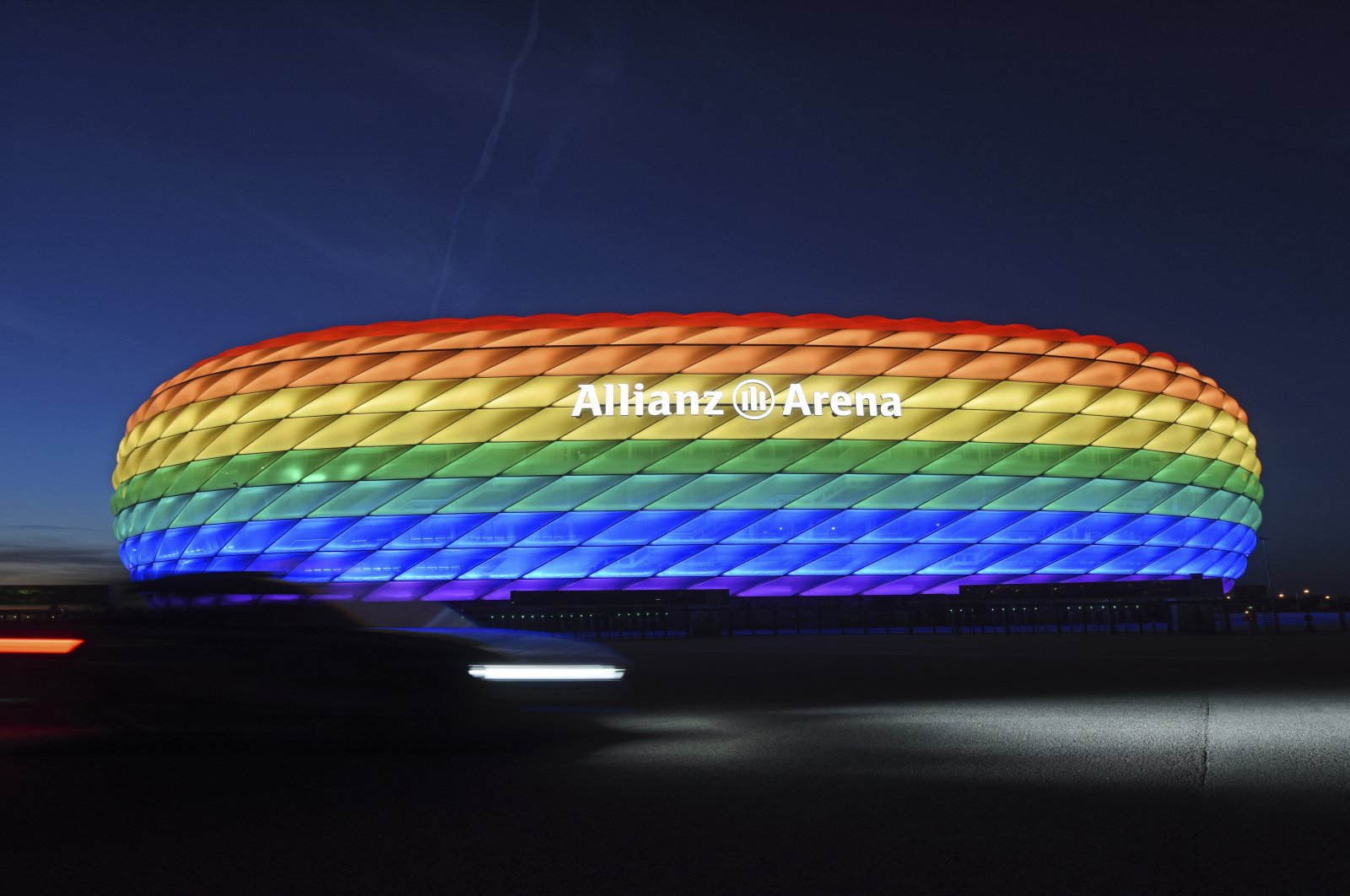 Munich's Allianz Arena illuminated in rainbow colors on the occasion of Christopher Street Day in Munich, Germany, July 9, 2016. (AP Photo)