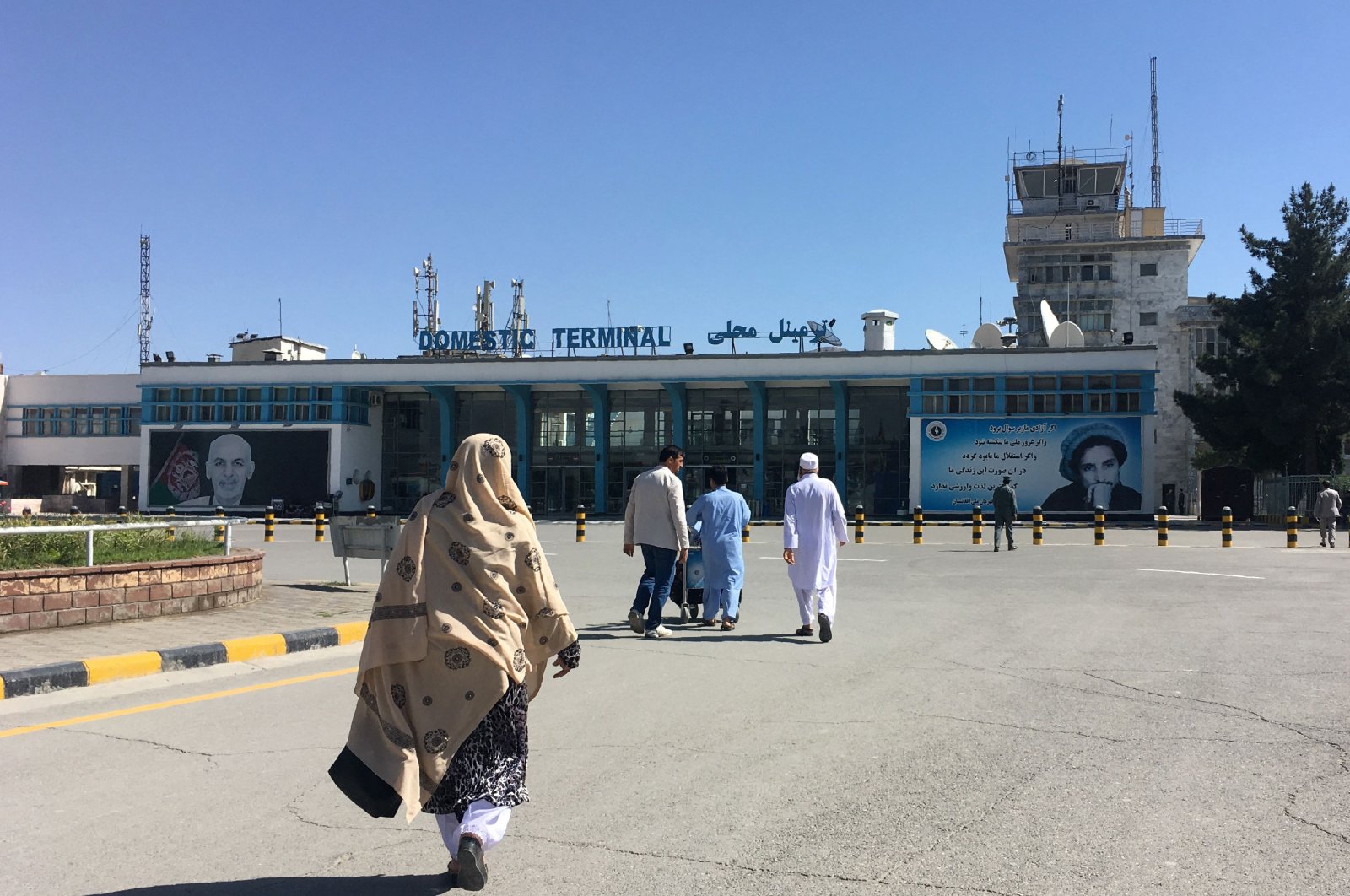 People arrive at the domestic terminal of the Hamid Karzai International Airport in Kabul, Afghanistan, May 8, 2018. (AFP Photo)