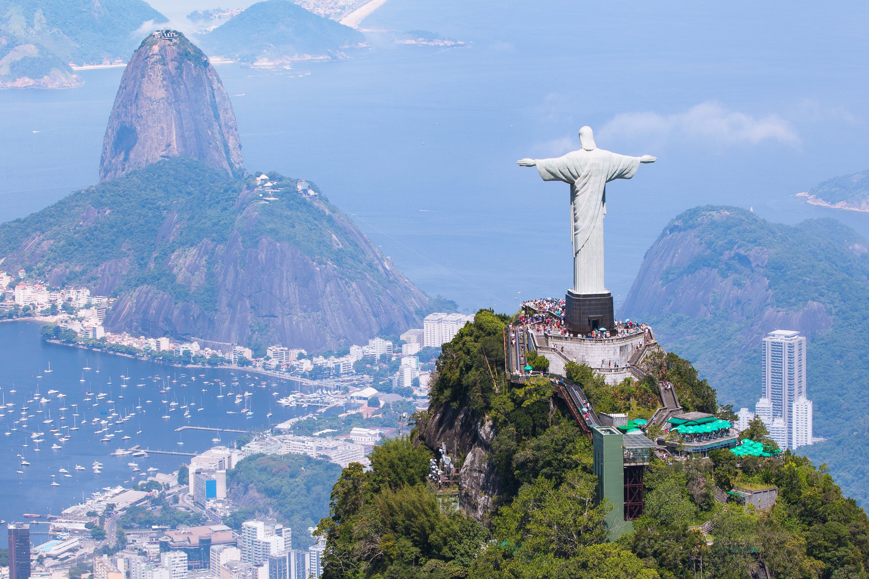 Aerial view of Rio de Janeiro featuring Christ the Redeemer and Corcovado Mountain. (Shutterstock Photo)