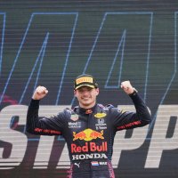 Red Bull driver Max Verstappen of the Netherlands celebrates from the podium after winning during the French Formula One Grand Prix at the Paul Ricard racetrack in Le Castellet, southern France, Sunday, June 20, 2021. (AP Photo/Francois Mori)