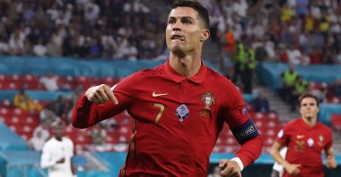 Portugal forward Cristiano Ronaldo celebrates after scoring a second penalty during the UEFA Euro 2020 Group F match against France at Puskas Arena, Budapest, Hungary, June 23, 2021. (AFP Photo)