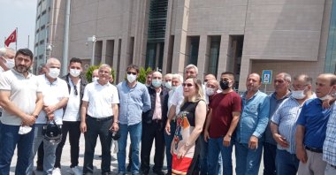 Firefighters and their lawyer outside the courthouse in Istanbul, Turkey, June 24, 2021. (DHA PHOTO) 