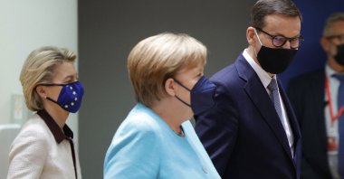 European Commission President Ursula von der Leyen (L) follows behind German Chancellor Angela Merkel (C) and Polish Prime Minister Mateusz Morawiecki on the first day of a European Union (EU) summit at the European Council Building in Brussels, Belgium, June 24, 2021. (AFP Photo)