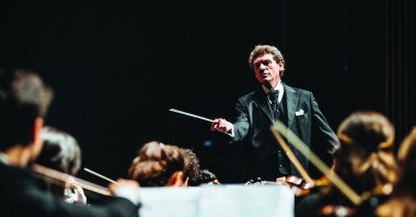 Cem Mansur prepared the themes for the Cemal Reşit Rey (CRR) Symphony Orchestra's concert series.