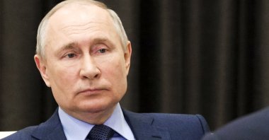 Russian President Vladimir Putin listens to Sergei Chemezov, the head of state-run RosTech, during a meeting at the Novo-Ogaryovo residence outside Moscow, Russia, June 24, 2021. (AP Photo)