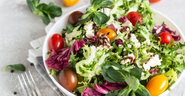 A fresh seasonal salad makes for a perfect side dish. But why not make it your main dish and cut down on time in the kitchen altogether? (Shutterstock Photo)