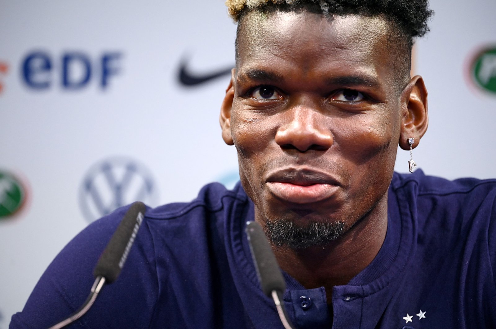 France's midfielder Paul Pogba speaks during a press conference at the team's base camp in Clairefontaine-en-Yvelines on June 10, 2021 ahead of the UEFA EURO 2020 football competition. (AFP Photo)