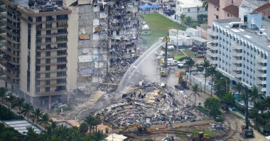 Rescue personnel work at the remains of the Champlain Towers South Condo in Surfside, Florida, U.S., June 25, 2021. (AP Photo)