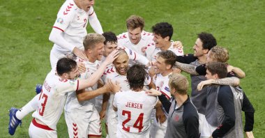 Denmark's Martin Braithwaite (C) celebrates with his teammates after his goal against Wales during the Euro 2020 match against Wales at Johan Cruyff Arena in Amsterdam, the Netherlands, June 26, 2021. (AP Photo)