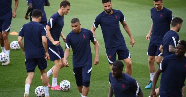 France forward Kylian Mbappe (C) and teammates take part in a training session at the Hidegkuti Stadium, Budapest, Hungary, June 22, 2021. (AFP Photo)