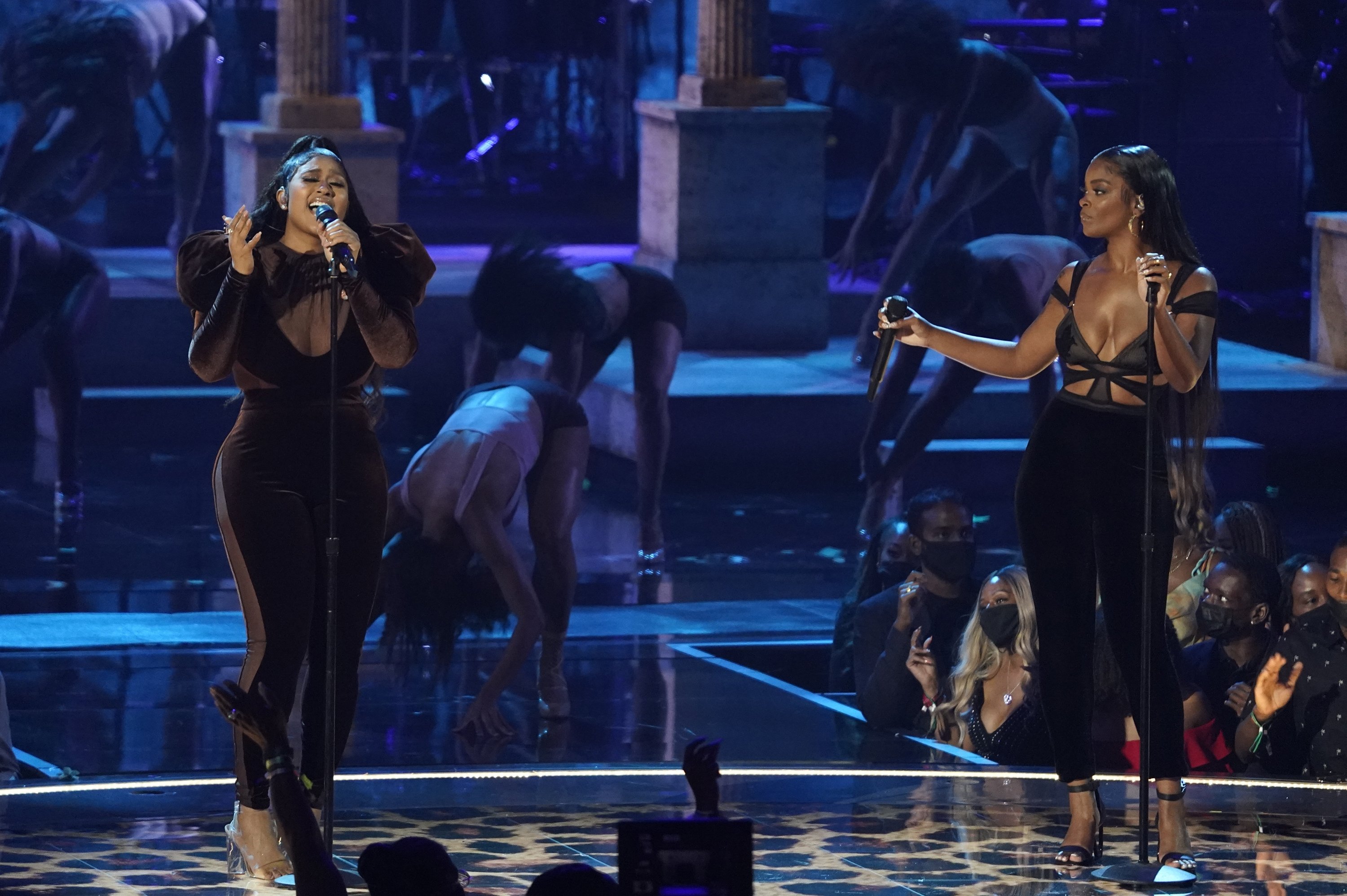 Jazmine Sullivan (L), and JT, of City Girls, perform at the BET Awards at the Microsoft Theater in Los Angeles, U.S., June 27, 2021. (AP Photo)