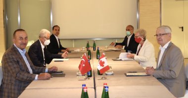 Foreign Minister Mevlüt Çavuşoğlu (L) attends a meeting with Canadian counterpart Mark Garneau (R) in Rome, June 27, 2021. (AA Photo)