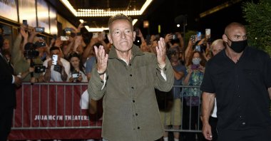 Singer-songwriter Bruce Springsteen exits the stage door after the "Springsteen On Broadway" reopening night performance at the Saint James Theater in New York, U.S., June 26, 2021. (AP Photo)