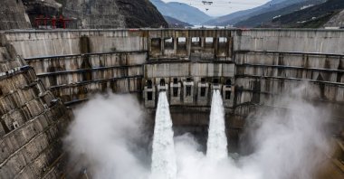 In this photo released by Xinhua News Agency, water is released from the dam of Baihetan hydropower station in Ningnan county, Sichuan province, southwestern China, June 27, 2021. (AP Photo)