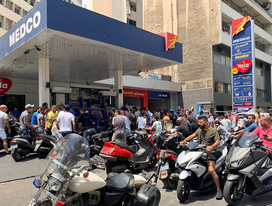 Motorbike drivers wait to get fuel at a gas station in Beirut, Lebanon, June 29, 2021. (Reuters Photo)