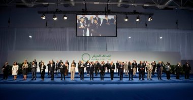 Members of the U.S.-led coalition against Daesh pose for a family photo at the Fiera di Roma, in Rome, Italy, on June 28, 2021. (AFP Photo)