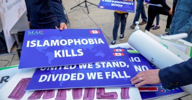 Attendees return signs after a rally to highlight Islamophobia, sponsored by the Muslim Association of Canada, Toronto, Ontario, Canada, June 18, 2021. (REUTERS Photo)