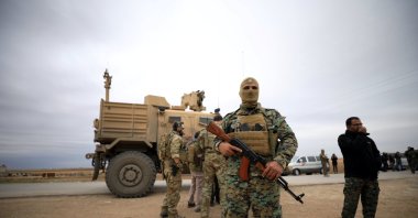 YPG/PKK terrorists and U.S. troops are seen during a patrol near the Turkish border in Hassakeh, Syria, Nov. 4, 2018. (Reuters File Photo)