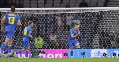 Ukraine's forward Artem Dovbyk (2nd R) celebrates scoring their second goal during the UEFA Euro 2020 round of 16 match against Sweden at Hampden Park in Glasgow, Scotland, June 29, 2021. (AFP Photo)