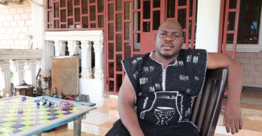 Former Liberian rebel Joshua Blayhi, also known as "General Butt Naked," poses for a portrait at his compound in Monrovia, Liberia, June 8, 2021. (AFP Photo)