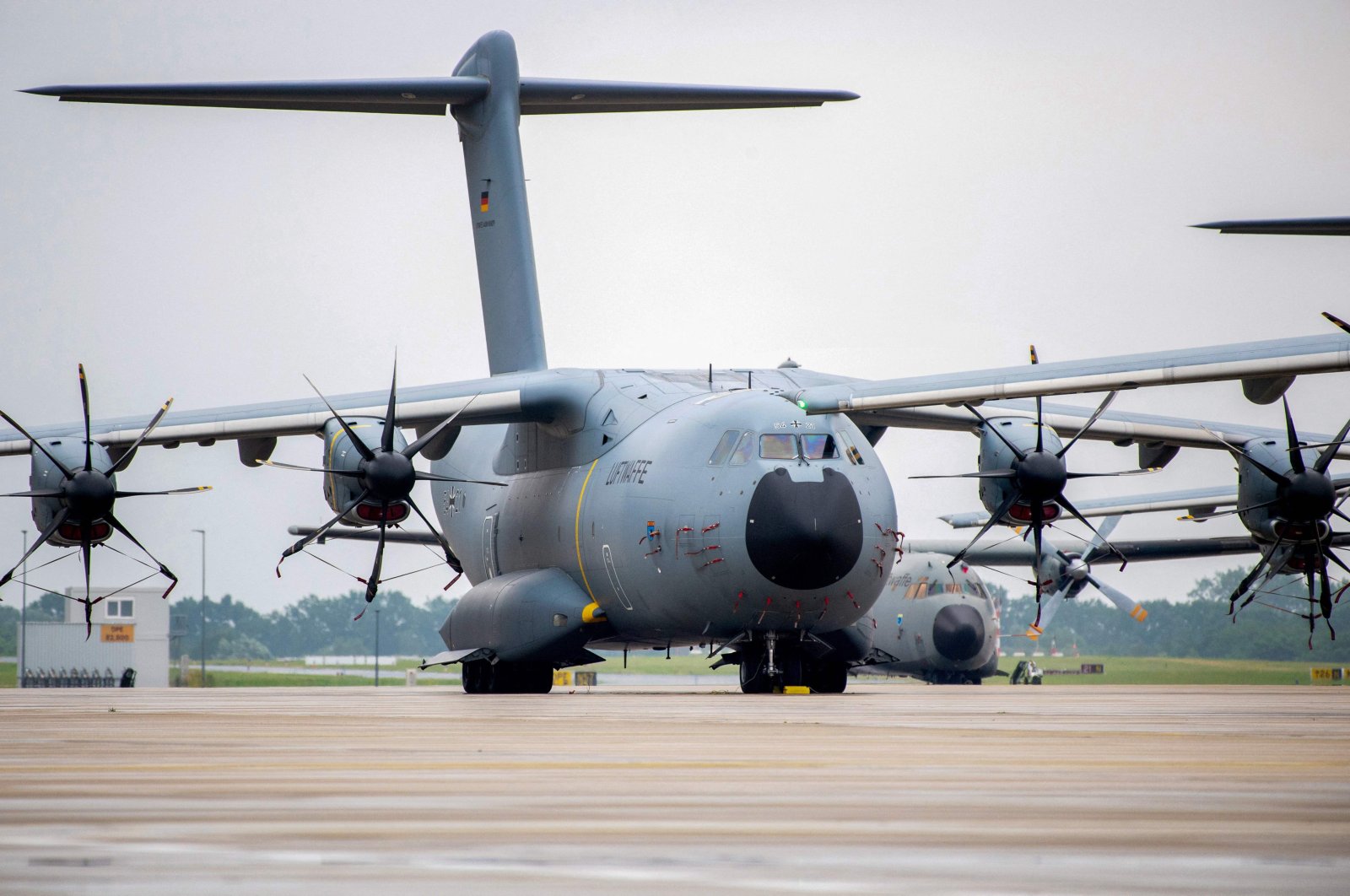 Airbus A400M cargo planes of the German armed forces Bundeswehr stand on the tarmac at the military air base in Wunstorf, northern Germany, on June 30, 2021, as German soldiers returning from Afghanistan are expected to land here. (AFP Photo)