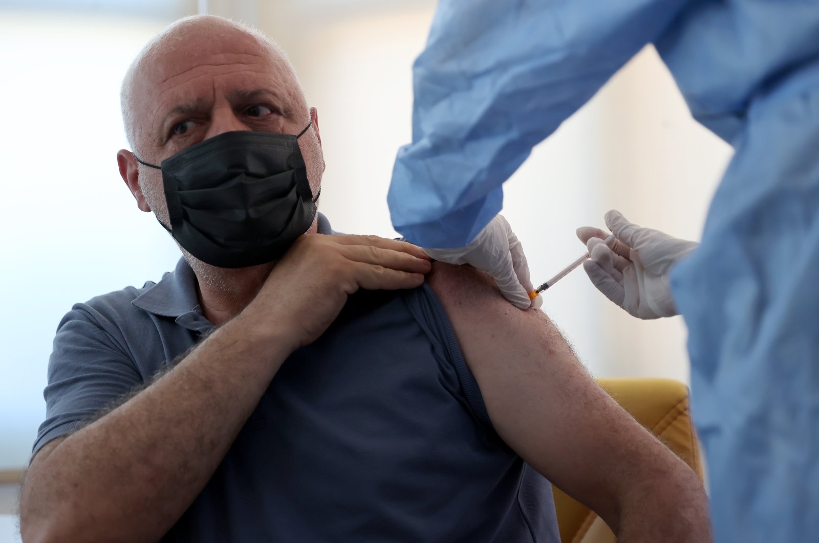 A man receives a dose of a COVID-19 vaccine at a vaccination center in Istanbul, Turkey, June 30, 2021. (AA Photo)
