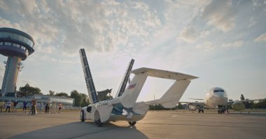 Slovakian company Klein Vision's flying car prototype AirCar is seen at the airport in Bratislava, Slovakia, June 28, 2021. (Klein Vision handout via Reuters)