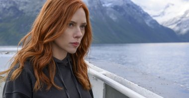 Scarlett Johansson looks off into the distance in a scene from Marvel superhero film "Black Widow." (Disney via AP)
