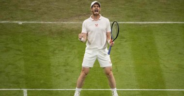 Britain's Andy Murray wins a point against Germany's Oscar Otte during the 2021 Wimbledon men's singles second-round match at The All England Tennis Club in Wimbledon, southwest London, England, June 30, 2021. (AFP Photo)