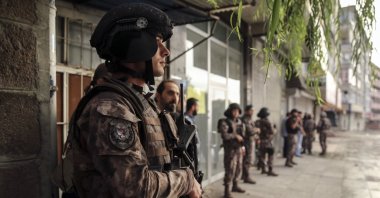 Counterterrorism police stand in front of a building during a raid in Turkey's capital Ankara, Turkey, Nov. 11, 2018. (AA File Photo)