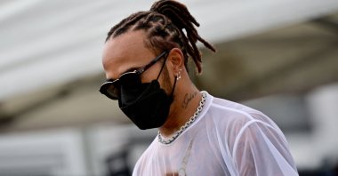 Mercedes' British driver Lewis Hamilton walks to the paddock at the Red Bull Ring race track in Spielberg, Austria, July 1, 2021. (AFP Photo)