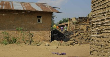 Blood is seen on the gravel between houses after 10 people were killed in an attack overnight by suspected members of the Allied Democratic Forces (ADF) armed group in Rwangoma, Beni, Democratic Republic of Congo, July 1, 2021. (AFP Photo)