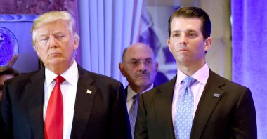 Former U.S. President Donald Trump and his son Donald, Jr., arrive for a press conference at Trump Tower in New York, as Allen Weisselberg (C), chief financial officer of The Trump Organization, looks on, New York, U.S., Jan. 11, 2017. (AFP Photo)