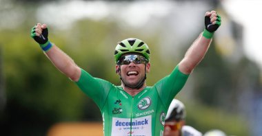 Team Deceuninck Quickstep's Mark Cavendish of Great Britain celebrates as he crosses the finish line of the 6th stage of the 108th edition of the Tour de France cycling race, 160 km between Tours and Chateauroux, July 1, 2021. (AFP Photo)