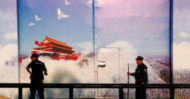 Security guards stand at the gates of what is officially known as a vocational skills education center in Huocheng County in Xinjiang Uighur Autonomous Region, China, Sept. 3, 2018. (Reuters Photo)