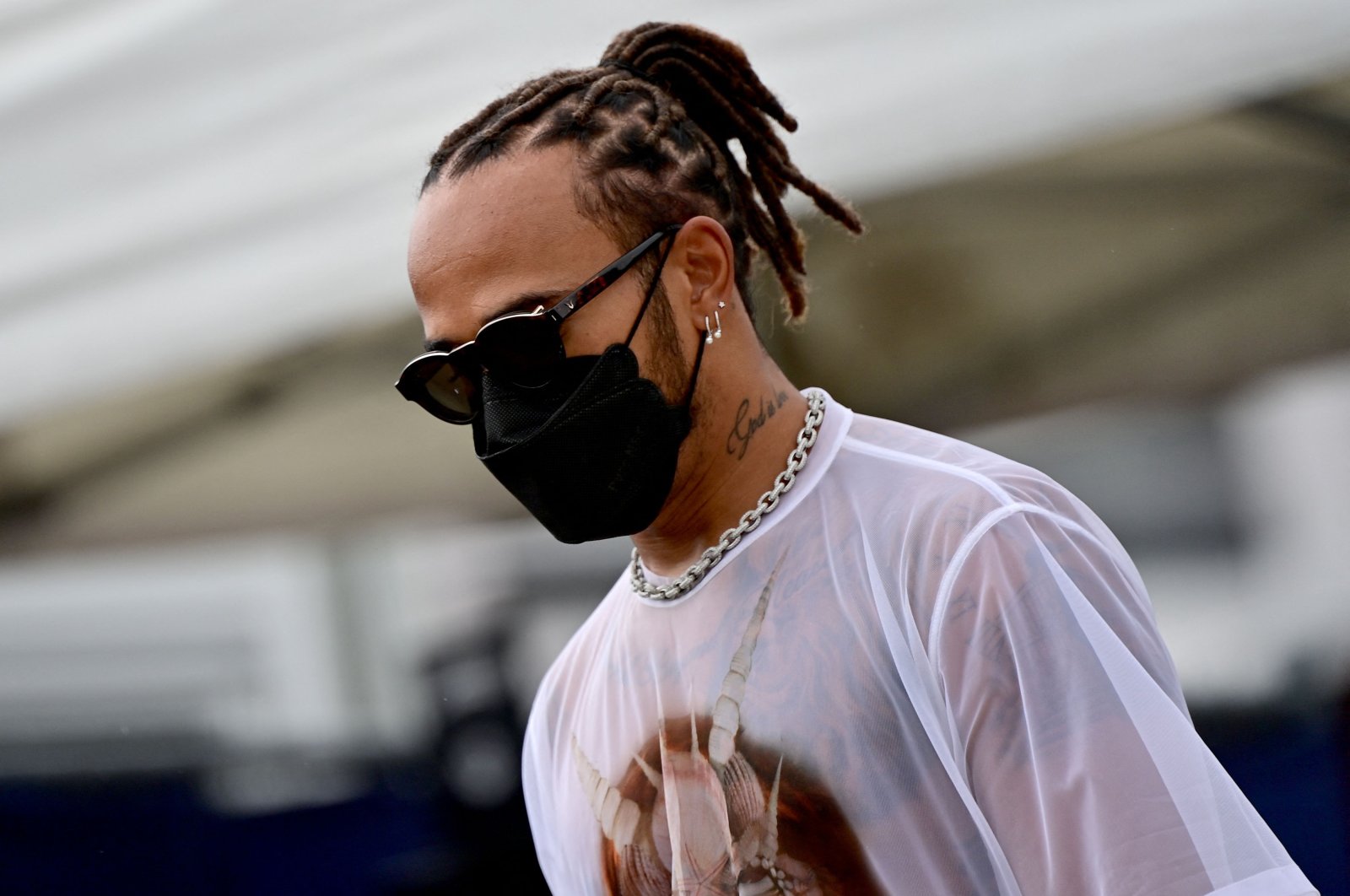 Mercedes' British driver Lewis Hamilton walks to the paddock at the Red Bull Ring race track in Spielberg, Austria, July 1, 2021. (AFP Photo)
