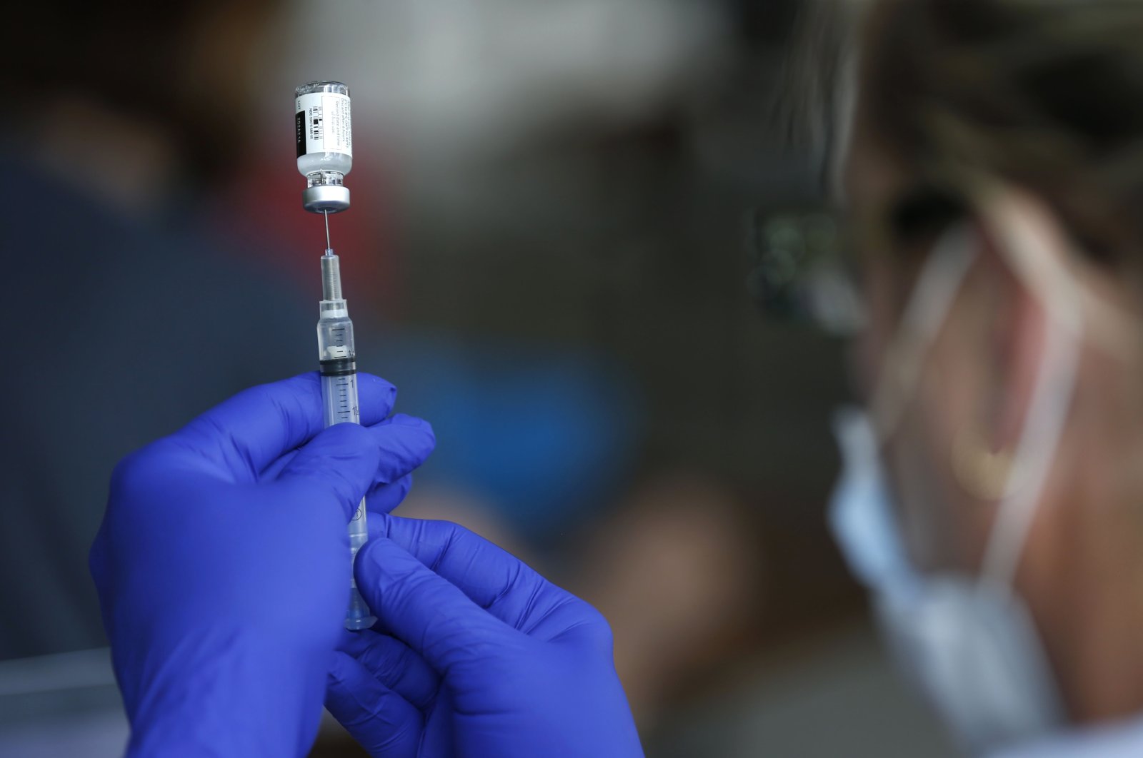 A nurse draws a syringe full of Johnson & Johnson's COVID-19 vaccine at a clinic at Mother's Brewing Company in Springfield, Missouri, U.S., June 22, 2021. (AP Photo)