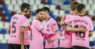 Barcelona players celebrate a goal during a La Liga match against Levante, in Valencia, Spain, May 11, 2021. Barcelona is known for its tiki-taka play style, which involves frequent short passes. (AP Photo)