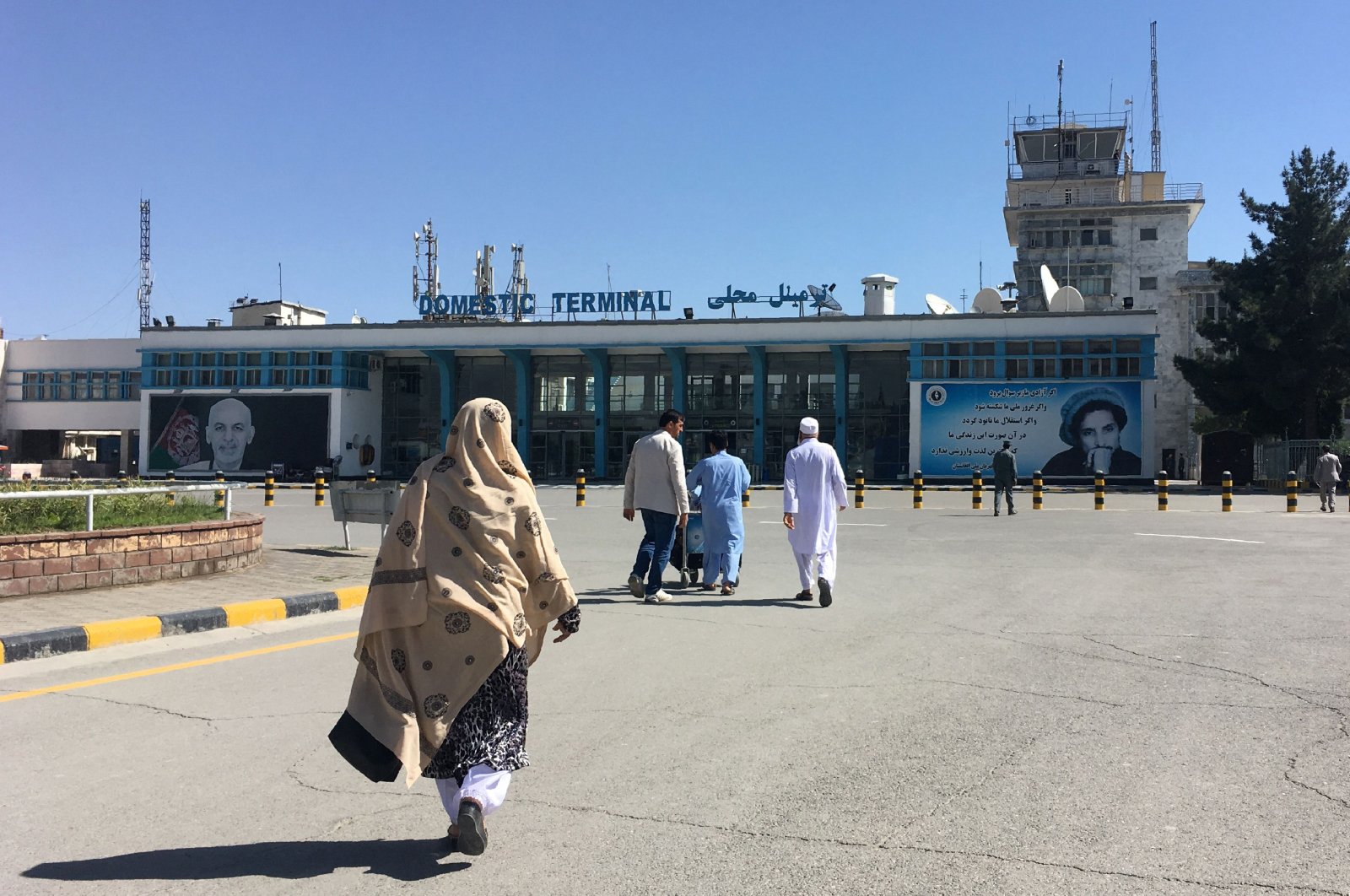 People arrive at the domestic terminal of the Hamid Karzai International Airport in Kabul, Afghanistan, May 8, 2018. (AFP Photo)