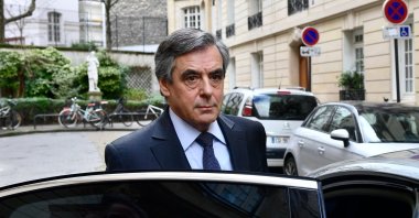 In this file photo taken on February 24, 2020, former French prime minister Francois Fillon leaves his home in Paris. (AFP Photo)